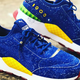 Illustration for article titled Pumas New iSonic The Hedgehog/i Sneakers Are Very Hairy